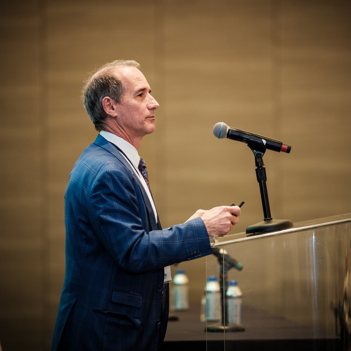 Thomas Serena, M.D. speaking at a podium